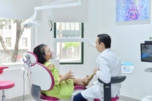 The dentist provides guidance on implant dental care