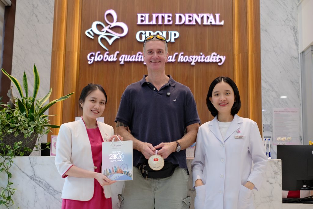 Mr. Probert alongside Dr. Hang and the customer service officer at Elite Dental